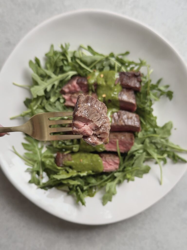Quick and easy 30-minute steak dinner plated with herbs and chimichurri – gut-friendly protein meal by megannashhealth.